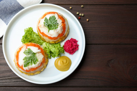 Delicious fish aspic served on wooden table, flat layの写真素材