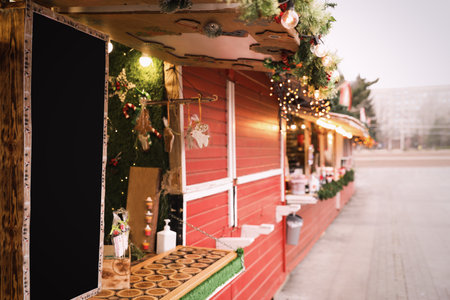 Bright Christmas fair stalls with decor outdoorsの写真素材