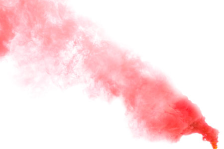 Woman with color smoke bomb and umbrella outdoors, closeupの写真素材