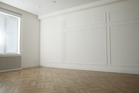 Parquet floor in light spacious empty roomの写真素材