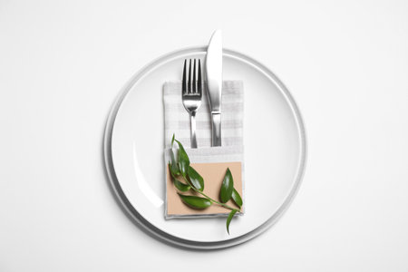 Stylish table setting on white background, top viewの写真素材