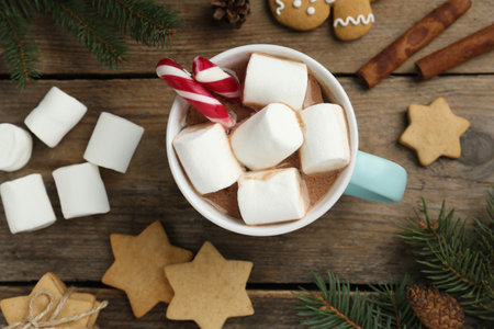 Flat lay composition with delicious marshmallow cocoa on wooden tableの写真素材