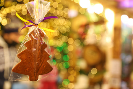Cookie on blurred background, space for text. christmas fair treatの写真素材