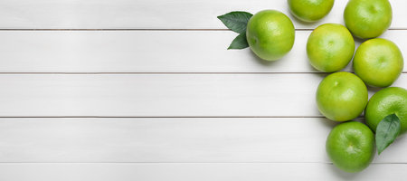 Fresh ripe sweeties on white wooden table, flat lay. Space for textの写真素材