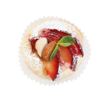 Delicious cupcake with plums isolated on white, top viewの写真素材