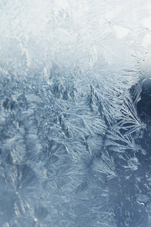 Beautiful frosty window as background, closeup. winter morningの写真素材