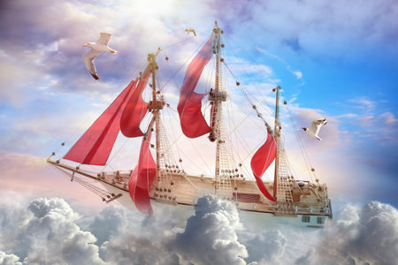 dreamworld. Sailing ship floating among wonderful fluffy cloudsの写真素材