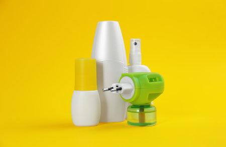 Set of different insect repellents on yellow backgroundの写真素材