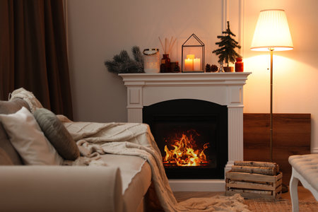 Fireplace in room with Christmas decorations. interior designの写真素材