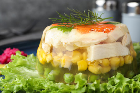 Delicious chicken aspic with vegetables on plate, closeupの写真素材