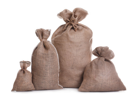 Burlap bags on white background. Organic materialの写真素材