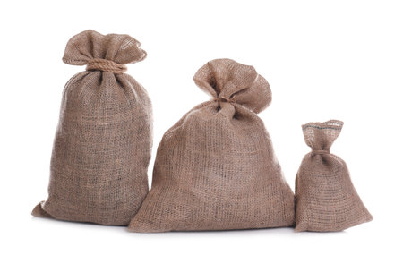 Burlap bags on white background. Organic materialの写真素材