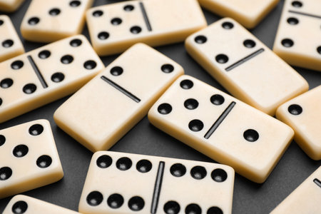 Classic domino tiles on black background, closeupの写真素材