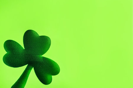 Decorative clover leaf on light green background, space for text. Saint Patrick's Day celebrationの写真素材