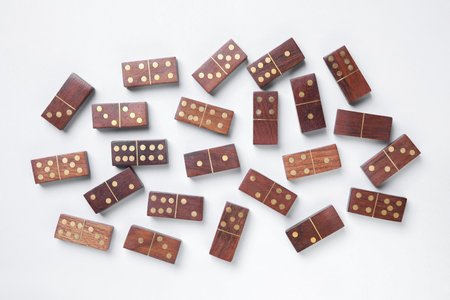 Wooden domino tiles on white background, flat layの写真素材
