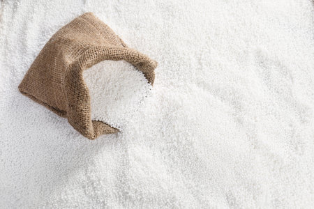 Sack bag and granular mineral fertilizer, top viewの写真素材