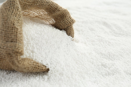 Sack bag and granular mineral fertilizer, closeupの写真素材