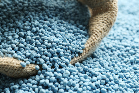 Sack bag and granular mineral fertilizer, closeupの写真素材