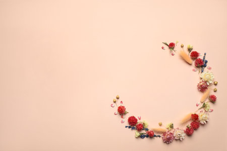 Flat lay composition with beautiful dried flowers on pink background. Space for textの写真素材