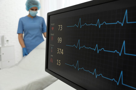 Monitor with cardiogram in hospital, focus on screenの写真素材