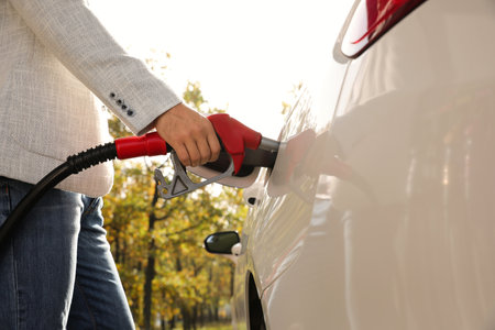 Man refueling car at self service gas station, closeupの写真素材