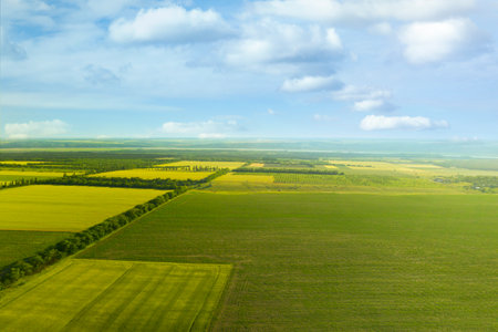 Beautiful aerial view of fields and blue skyの写真素材