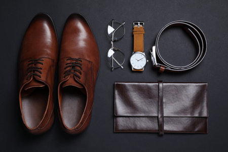 Men set with stylish accessorizes on black background, flat layの写真素材