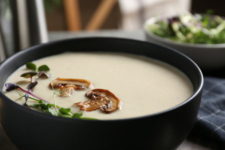 Delicious cream soup with mushrooms in bowl, closeupの写真素材