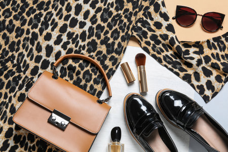 Stylish women's outfit on color background, flat layの写真素材