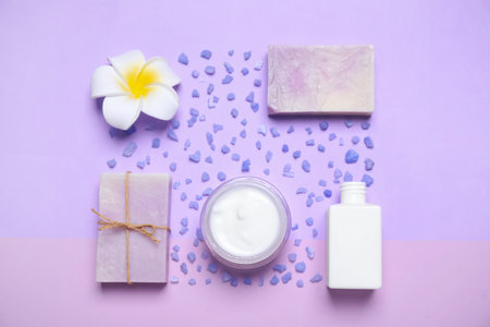 Flat lay composition with spa items on violet backgroundの写真素材