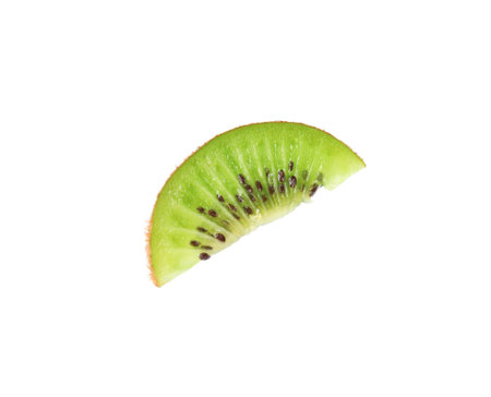 Slice of fresh ripe kiwi isolated on whiteの写真素材