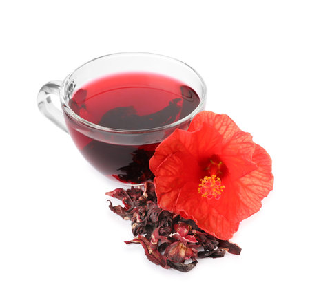 Delicious hibiscus tea and dry flowers on white backgroundの写真素材