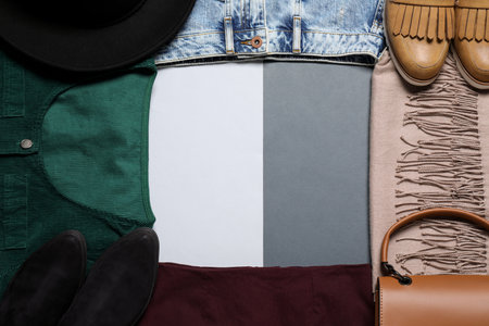 Frame of stylish clothes and accessories on color background, space for textの写真素材