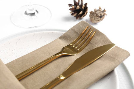 Elegant table setting on white background, closeup