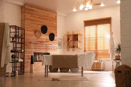 Stylish massage room interior in spa salonの写真素材
