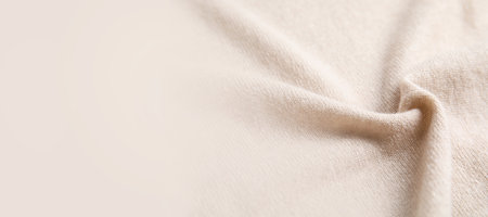 Warm cashmere fabric as background, closeup view with space for text. banner designの写真素材