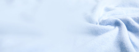 Warm cashmere fabric as background, closeup view with space for text. banner design