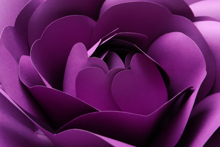 Beautiful purple flower made of paper as background, closeupの写真素材