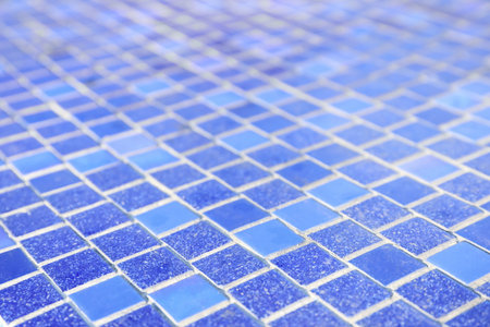 Surface covered with blue tiles as backgroundの写真素材