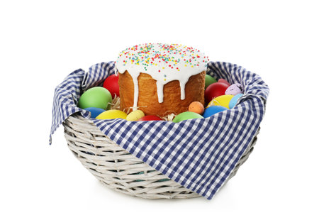 Traditional Easter cake and eggs in basket isolated on whiteの写真素材