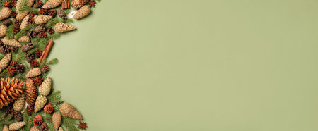 Flat lay composition with pinecones on green background, space for text. horizontal banner design