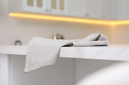 Clean kitchen towel on white marble table at home, closeupの写真素材