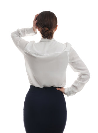 Young woman on white background, back viewの写真素材