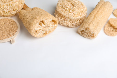 Natural shower loofah sponges on white backgroundの写真素材
