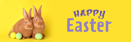 Happy Easter! Cute bunnies and dyed eggs on yellow background, banner designの写真素材