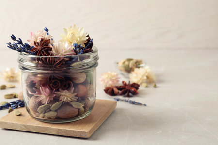Aroma potpourri with different spices on white table, space for textの写真素材