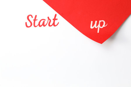 Words Start Up written on color background, top view. Space for textの写真素材