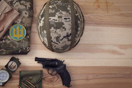 MYKOLAIV, UKRAINE - SEPTEMBER 26, 2020: Tactical gear, military uniform and Ukrainian army patch on...