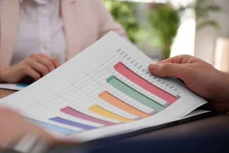Business people working with charts and graphs at table in office, closeup. investment analysisの写真素材