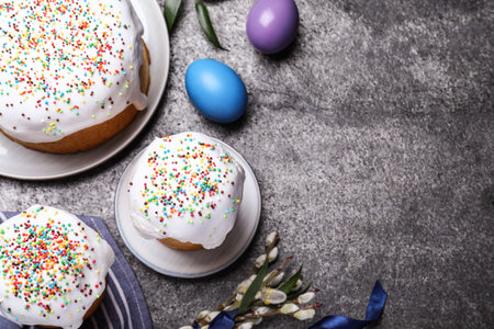 Flat lay composition with traditional Easter cakes on gray table. Space for textの写真素材